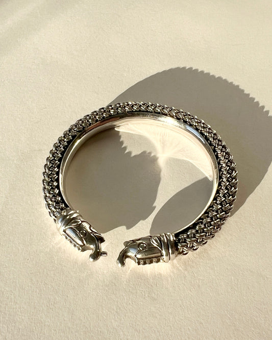 braided silver bracelet with elephant closure