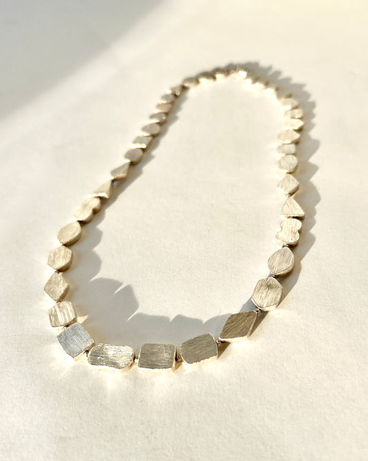 brushed silver shapes necklace