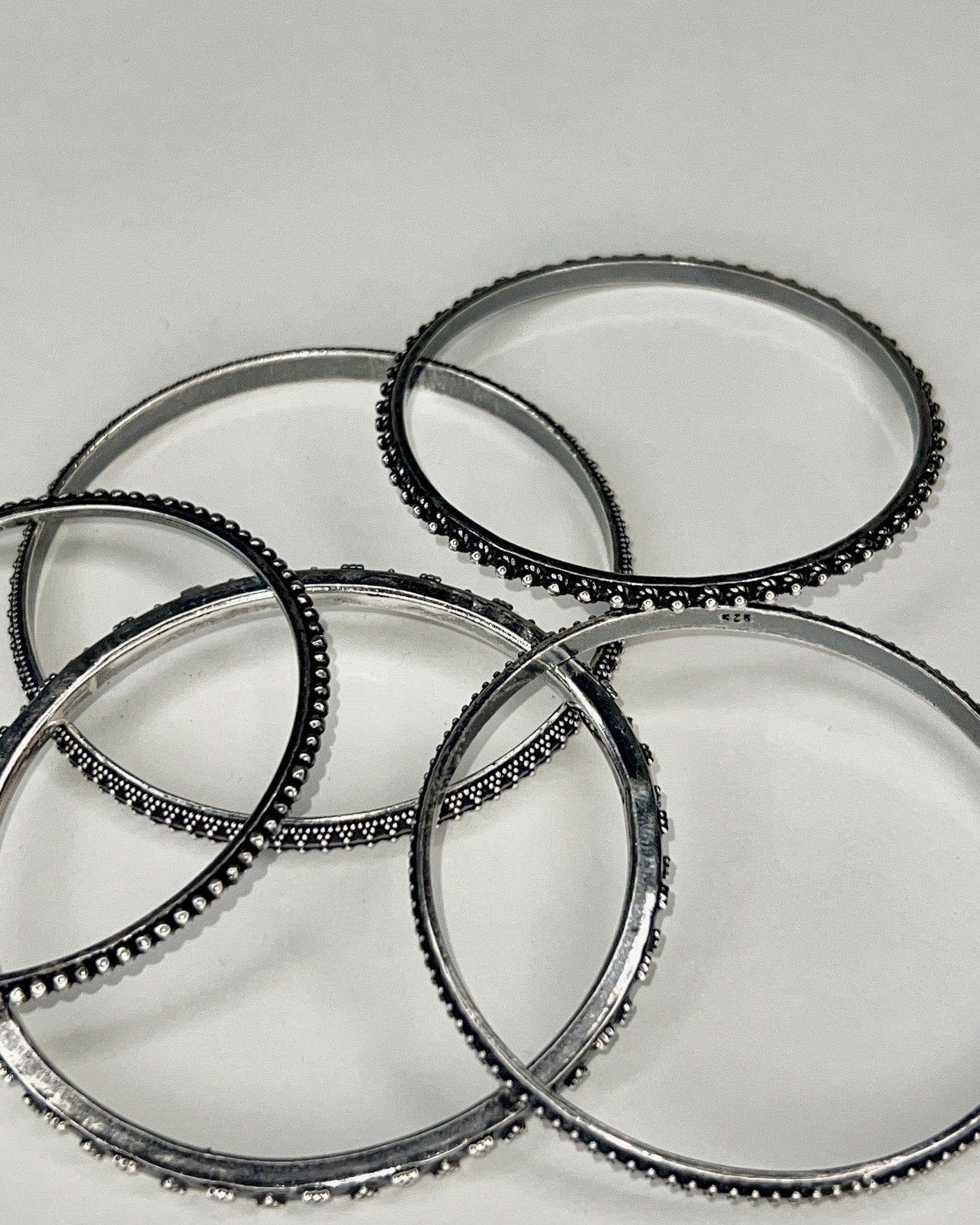 set of five silver bangles