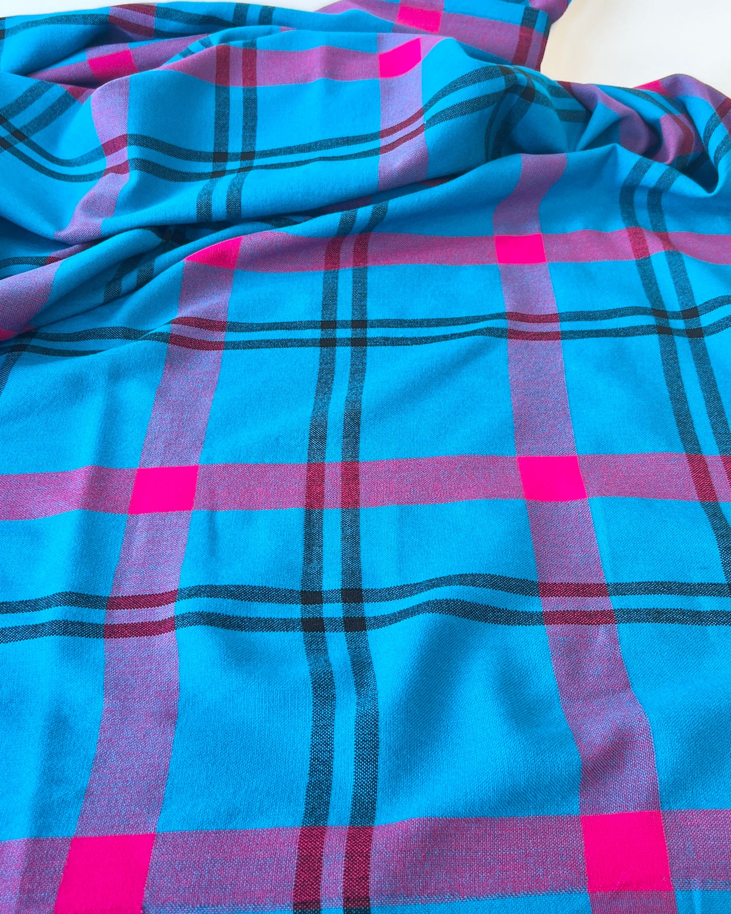 blue, black, and fuchsia plaid Masaai Shuka