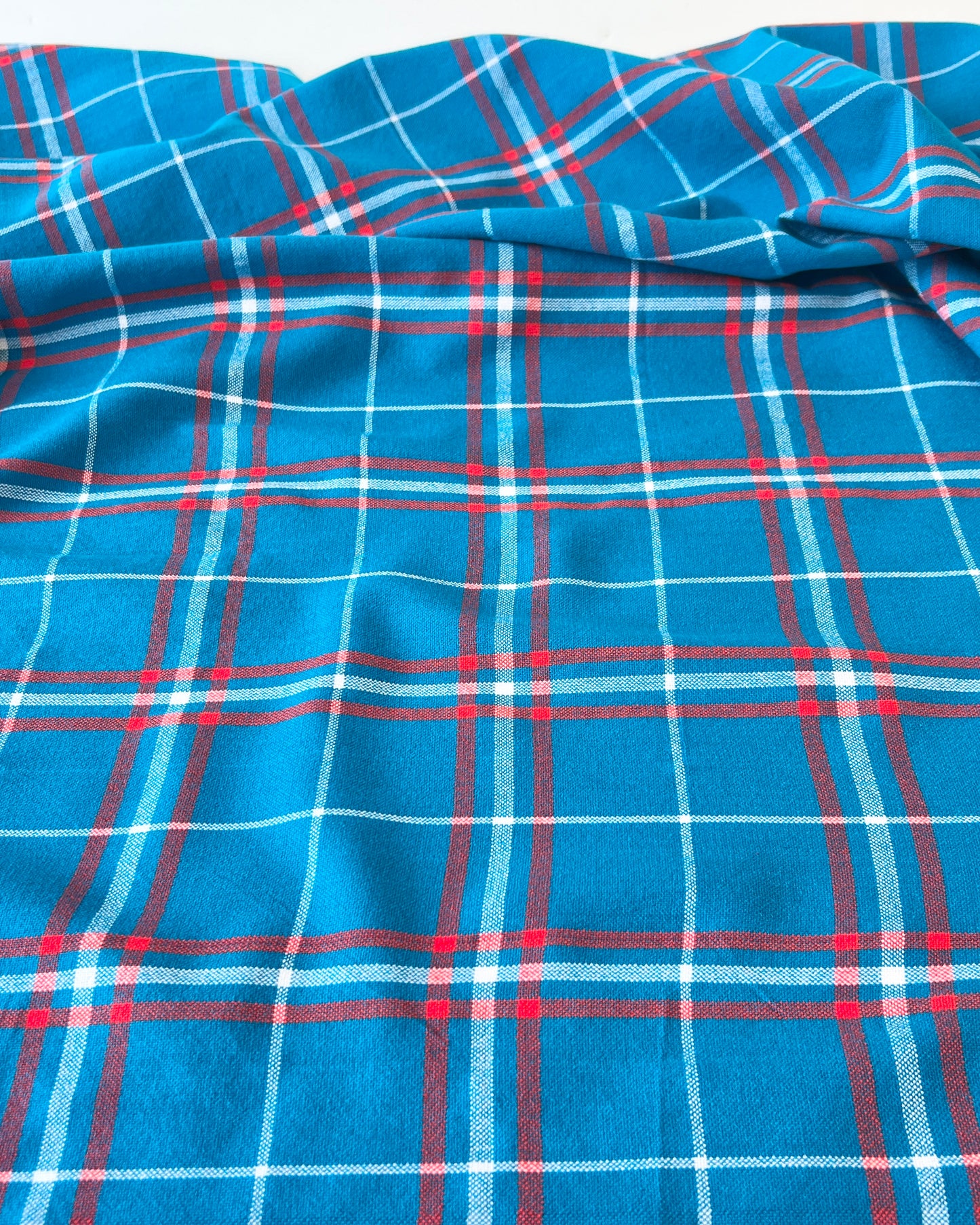 electric blue, white, and red plaid Masaai Shuka