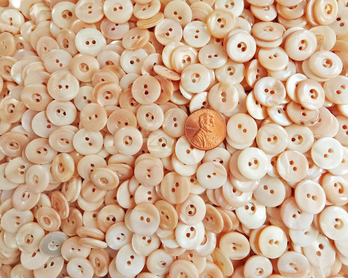 Mother of Pearl pale peach buttons