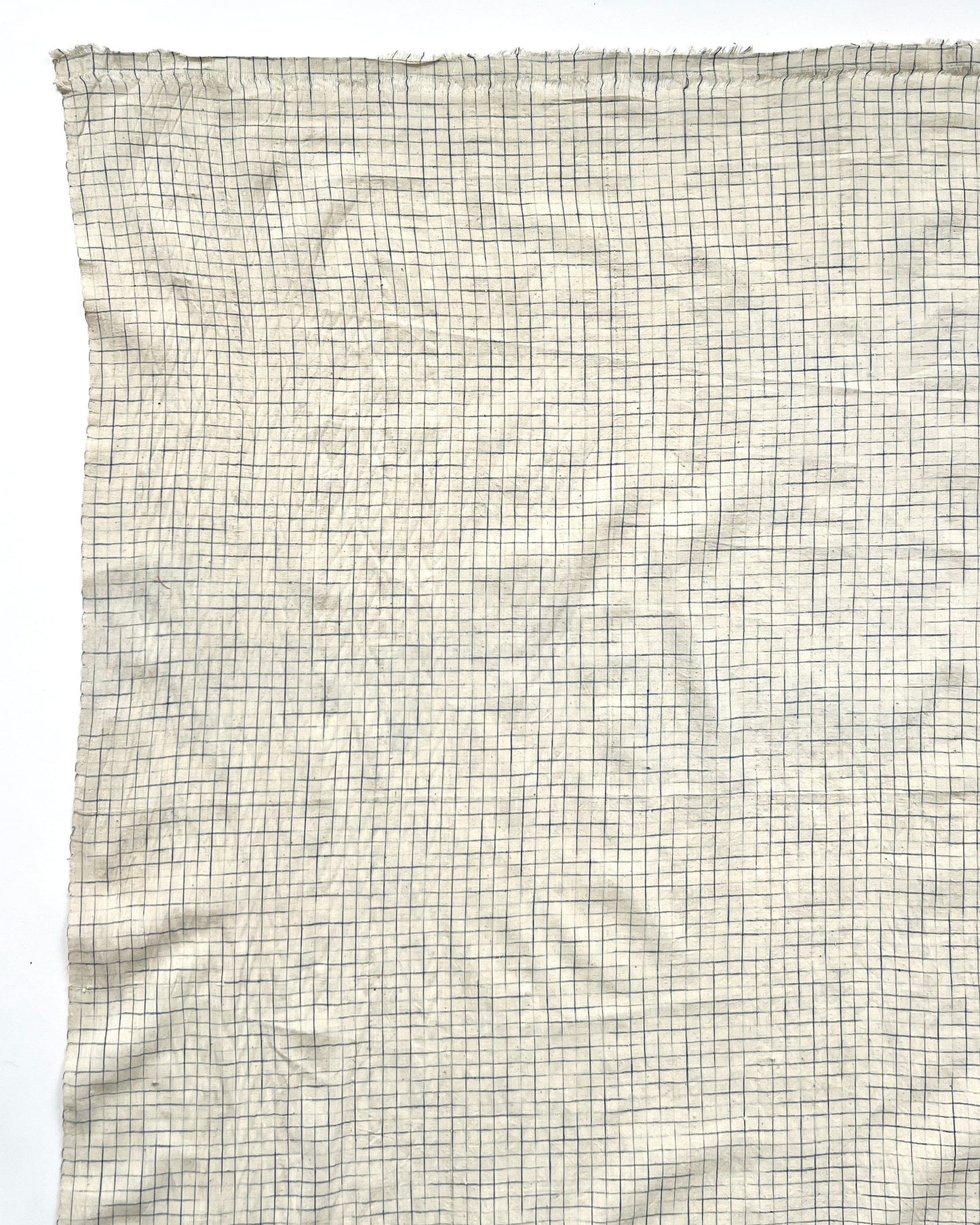 natural and indigo faded grid cotton