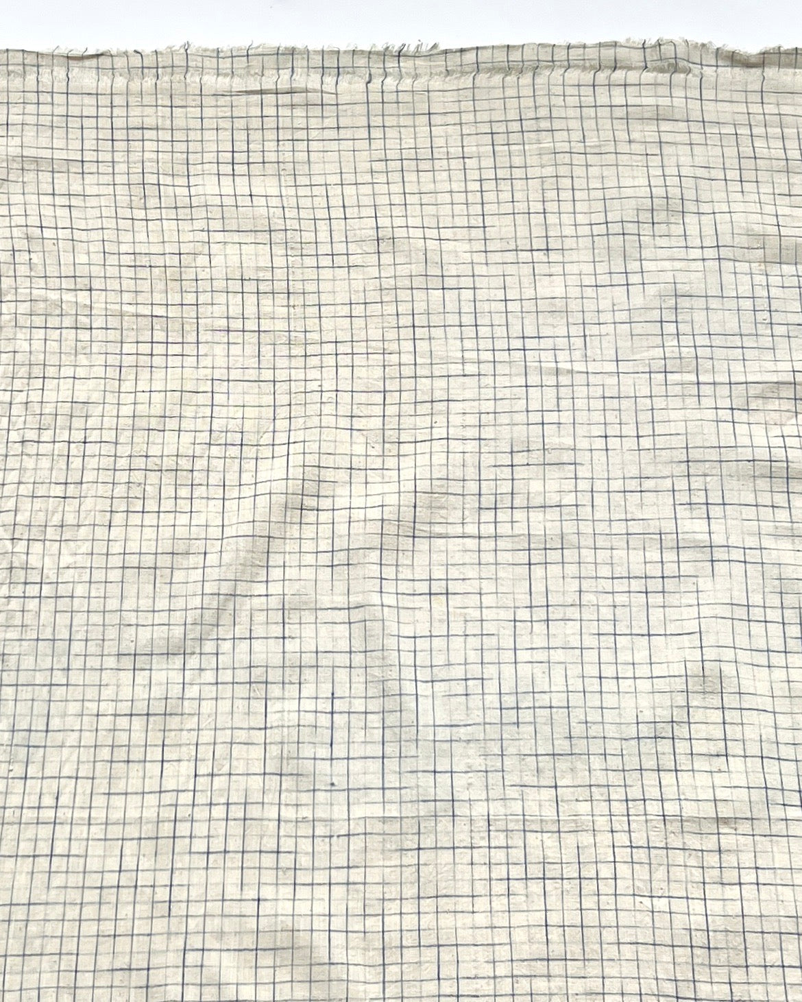 natural and indigo faded grid cotton