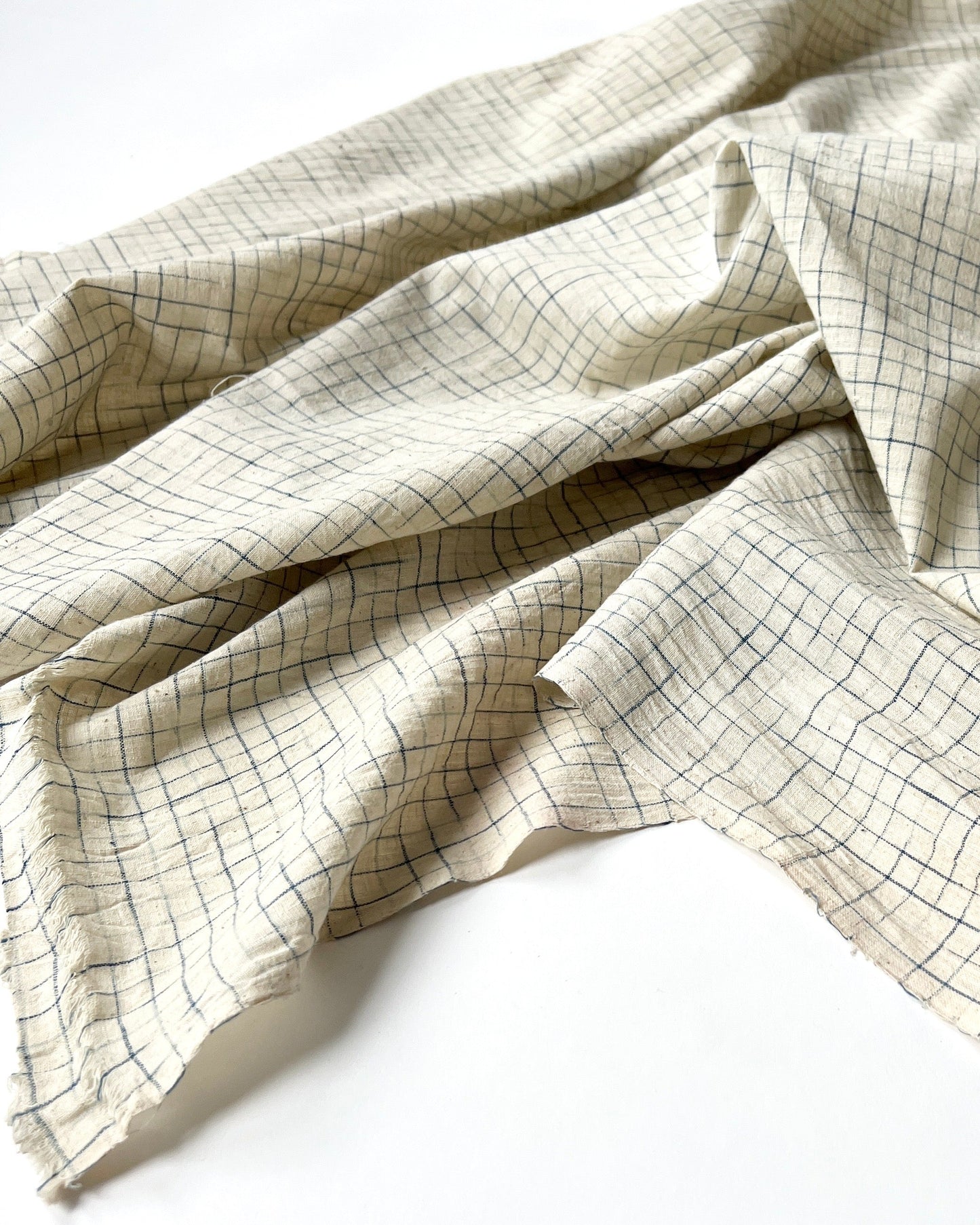 natural and indigo faded grid cotton