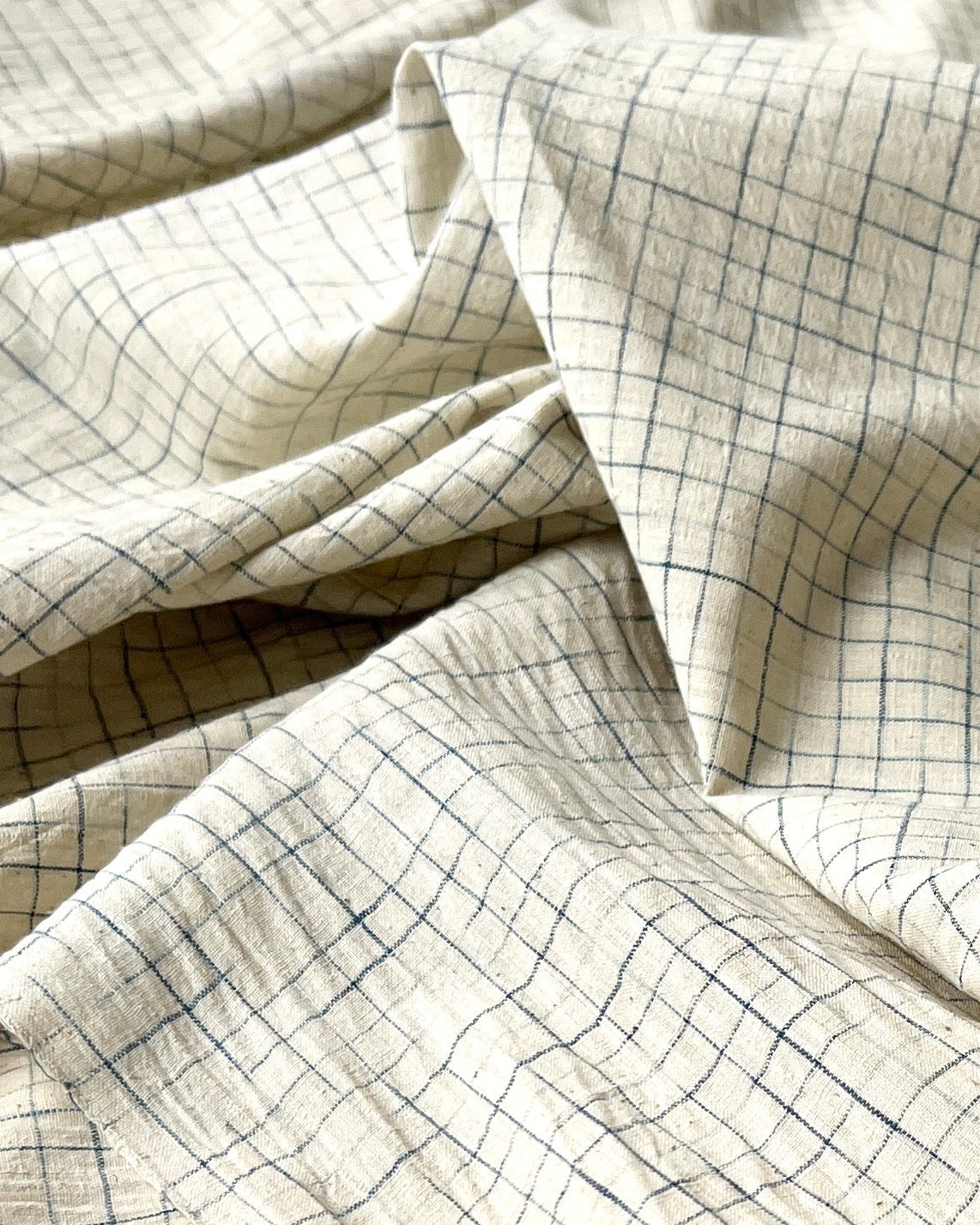 natural and indigo faded grid cotton