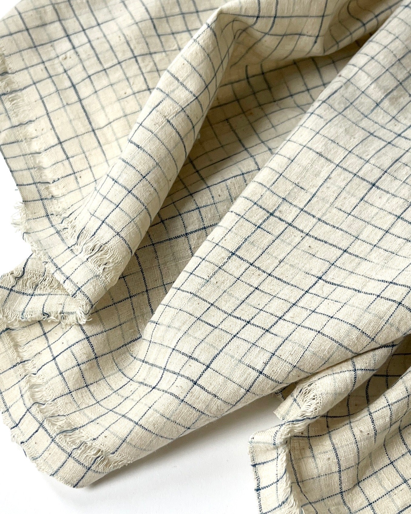 natural and indigo faded grid cotton